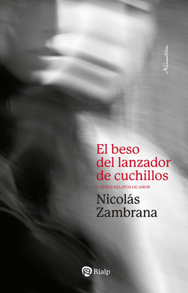 BESO DEL LANZADOR DE CUCHILLOS